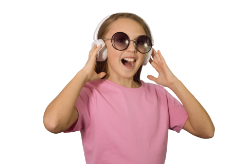 A 10 12 year old girl listens to music The high emotions are positive White headphones, pink T shirt