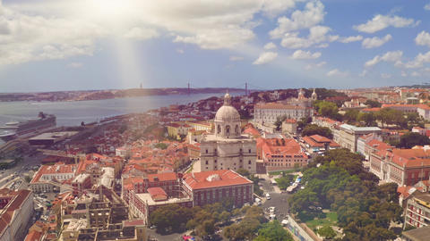 Lisbon skyline National Pantheon rising above Alfama quarter sunlit Tagus
