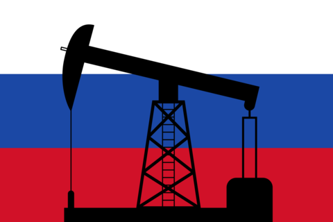 Silhouetting oil pumpjack against Russian flag, merging energy i