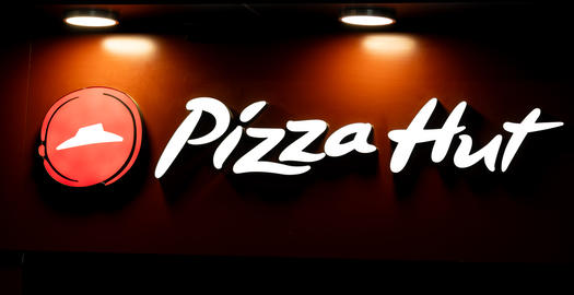 Large Sign At The Entrance With The Pizza Hut Logo