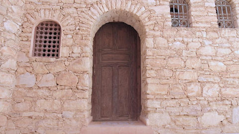 Old wooden door in a traditional Moroccan house