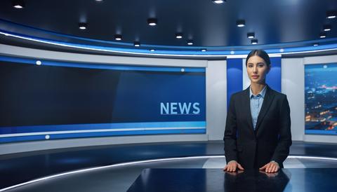 News program studio set and female announcer