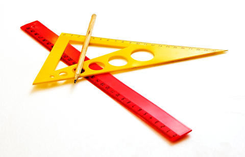 Ruler, pencil triangle on a white background
