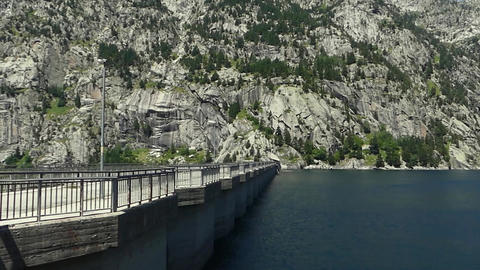 Majestic Reservoir Dam with Pyrenean Mountain Backdrop