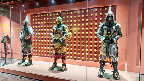 Ancient Chinese armor display featuring ornate plated warrior suit