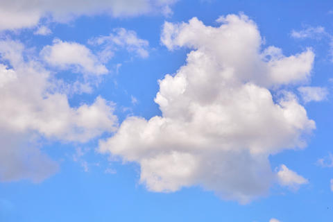White clouds in blue sky. Atmospheric calm mood