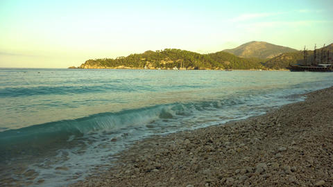 Tropical Beach at Sunrise with Gentle Waves