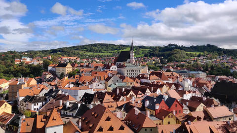 Cityscape of Krumlov with dark clouds