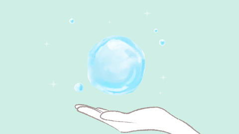 A sphere of water floating in the palm of my hand and sparkling light