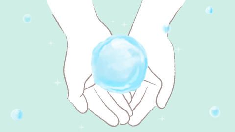 A sphere of water floating in the palm of my hand and sparkling light