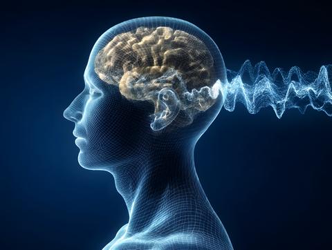 A detailed wireframe human head in profile view showcases an illuminated glowing brain emitting ener