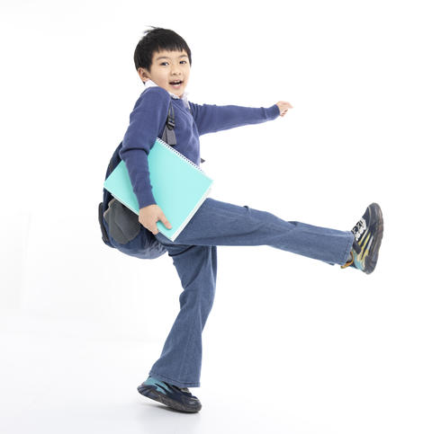 Happy boy with backpacks walk to school. Back to school, education, elementary school