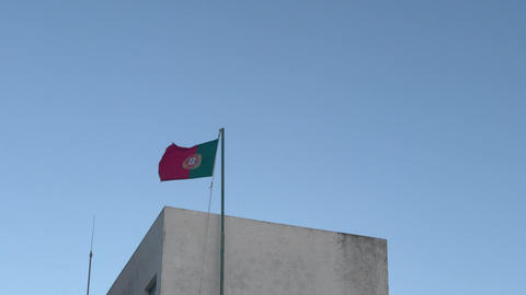 flag of Portugal on a blue sky background