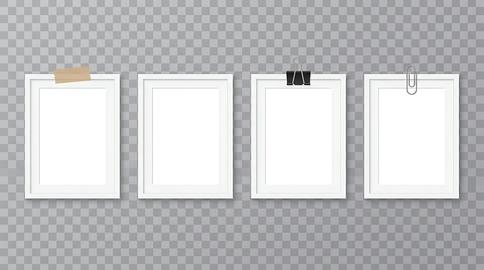 A set of four blank white picture frames with various clips on a gray transparent background, ideal