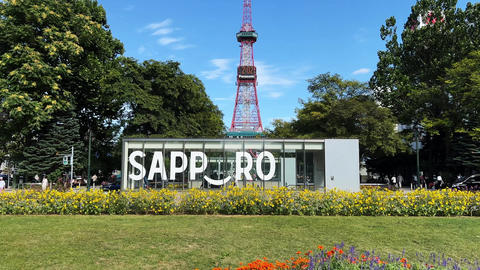 Underground mall entrance and Sapporo TV Tower at Odori Park in Hokkaido, Japan