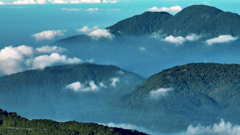 Aerial view above the sea of ​​clouds with the sunset
