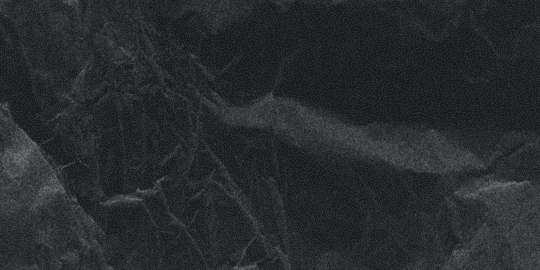 Rough distress paper texture with crushed folds and dotted halftone dust. Dark gritty sheet pattern