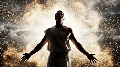 Man in White Garment with Outstretched Arms Emitting Burst of Divine Light