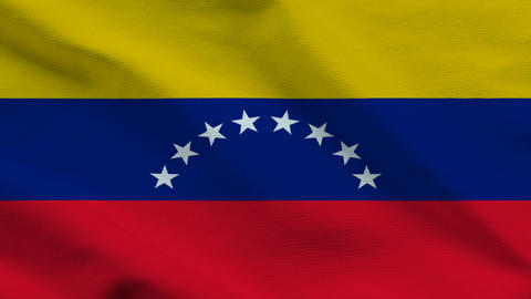 Venezuela flag on wavy fabric, top view. Realistic textile texture with yellow, blue, and red