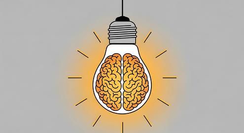 Illustrated light bulb containing a brain graphic, emitting warm rays against a plain backdrop
