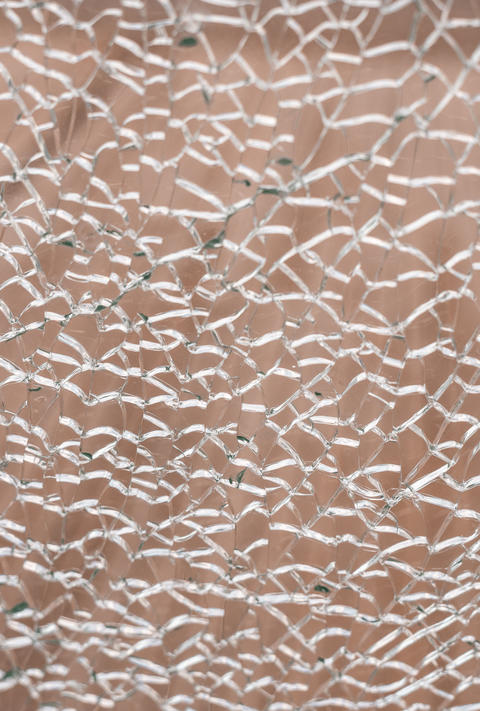 Abstract cracked texture resembling dry soil or drought affected earth. Natural
