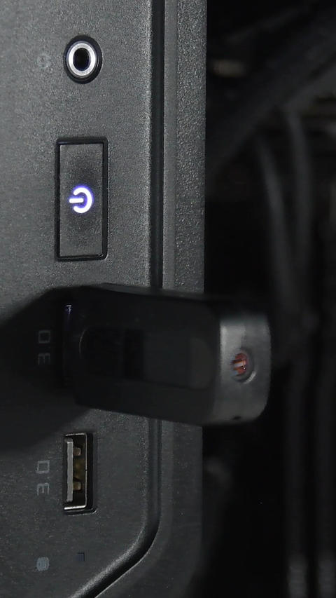 Inserting a USB 3 0 flash drive into a desktop computer slot