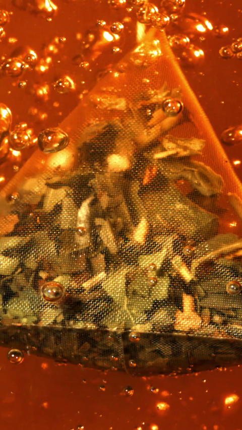 Black tea bag with air bubbles. Filmed on a high-speed camera at 1000 fps