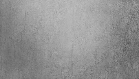 Gray rough plaster wall texture background with concrete surface