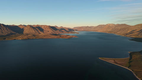 Aerial establishing shot pan right over Gilmimyul Bay in Arctic Chukotka