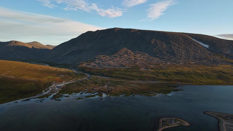 Side drift over arctic tundra river delta near Provideniya, Chukotka Russia