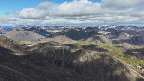 Top View horizontal pan across rugged tundra mountains Provideniya Chukotka