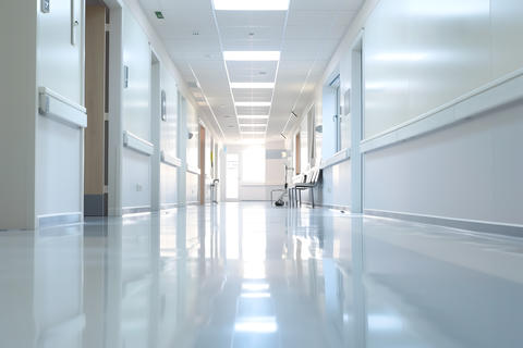 Empty and clean modern hospital corridor with bright lighting