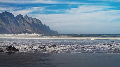 Atlantic Ocean Waves Hitting Volcanic Rocks On Rugged Coastal Shoreline, Canary