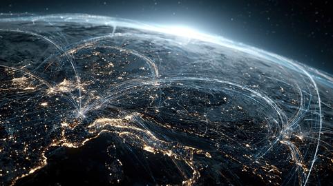 Planet Earth viewed from space at night with glowing digital