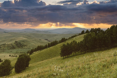 Devil’s Finger mountain landscape near Altai at dramatic sunset with storm clouds