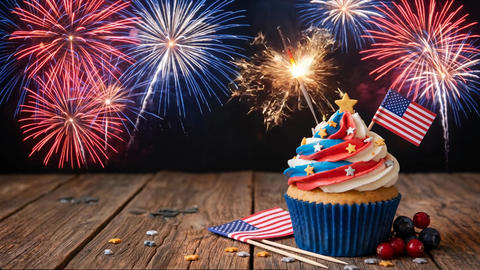 Patriotic cupcake with fireworks celebration background