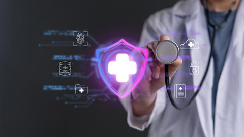 Doctor holding stethoscope touching neon virtual medical shield. Healthcare data security, patient p