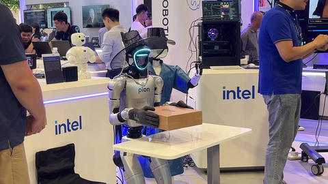 Taipei, Taiwan - June 5, 2026 - AI-driven automation: humanoid robots handling packages