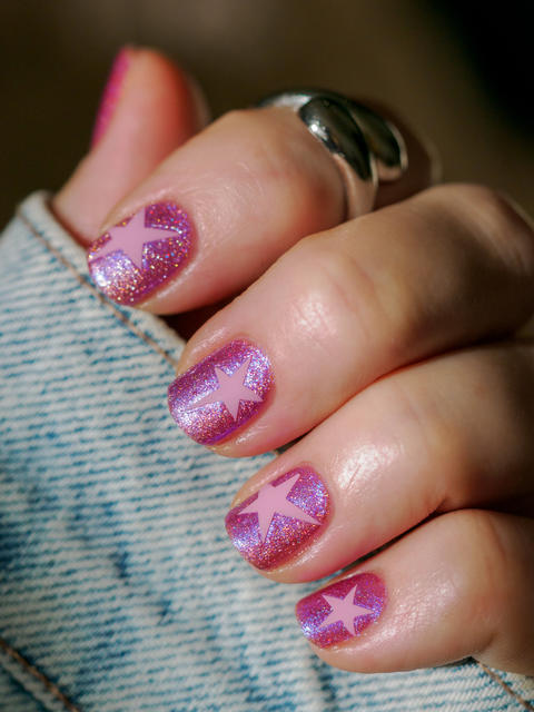 Pink star nail art manicure with denim jacket