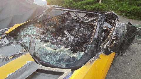 Burnt supercar wreckage after an accident