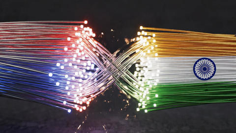 Fiber Optic Cables Of USA And India Flags Intertwining With Glowing Sparks Background