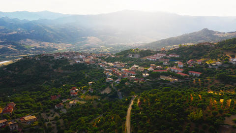 The ancient village of Careri in Calabria at sunset, with old houses