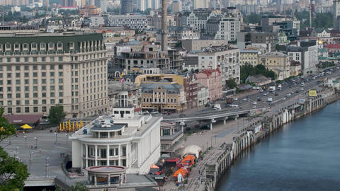 Vibrant dnieper embankment views in kyiv's podil district
