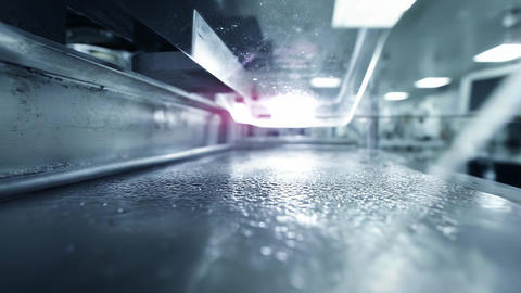 Industrial machine processing liquid on production line