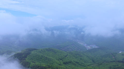 Aerial view of Seongjusan Mountain summit and rolling fog