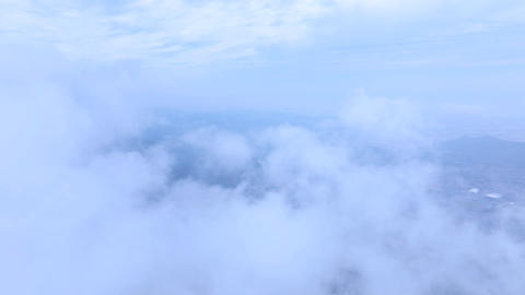 Aerial view of Seongjusan Mountain summit and rolling fog