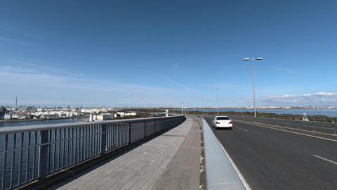 Cars driving on the Tokyo Gate Bridge