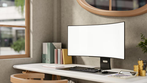 Blank screen computer aside calculator and gold coin with book and folder on working table in office