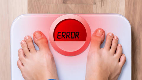 Digital Bathroom Scale Showing Error with Feet on Weight Scale