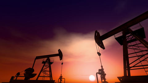 Silhouette of working oil pump jacks against a dramatic beautiful sunset sky. Looping 3D Animation